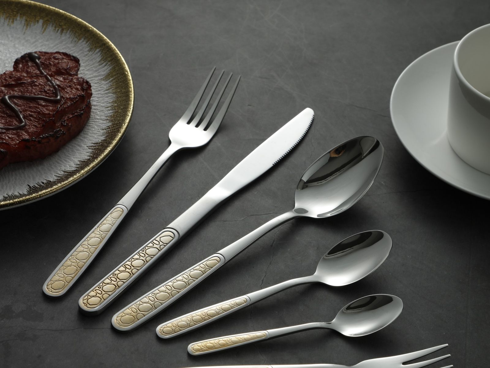Ornate Oval Pattern Gold-Trim Silverware Set